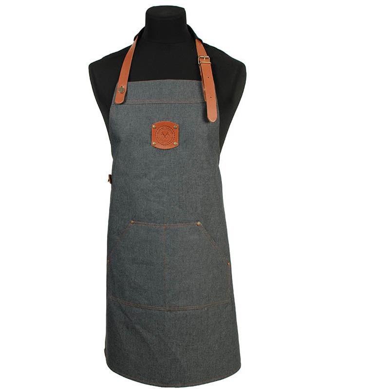 3703 Denim schort met leren riemen, banden en badge.